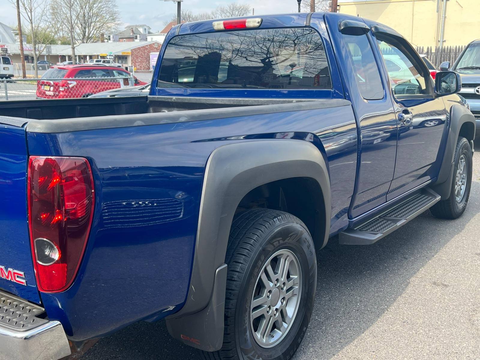 2012 Blue /gray GMC Canyon SLE Ext. Cab 4WD (1GTJ6MF98C8) with an 2.9L L4 DOHC 16V engine, located at 1018 Brunswick Ave, Trenton, NJ, 08638, (609) 989-0900, 40.240086, -74.748085 - Whether you are looking for a knock around truck for light duty errands or looking for a plow truck for your business, this GMC Canyon fits the bill perfectly! Just serviced and well maintained with low miles! Call Anthony to check it out! (609)273-5100 - Photo #4